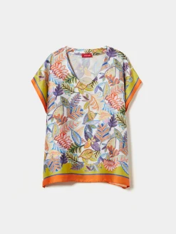 Blusa estilo poncho com padrão tropical|LION OF PORCHES Outlet
