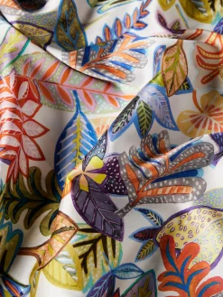 Blusa estilo poncho com padrão tropical|LION OF PORCHES Outlet