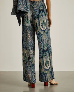 Calças pantalona com estampado cornucópia|LION OF PORCHES Online