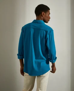 Camisa slim fit em malha piqué com carcela de polo|LION OF PORCHES New